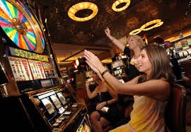 Mobile phone displaying DANA, OVO, and GoPay payment options on laku togel deposit screen